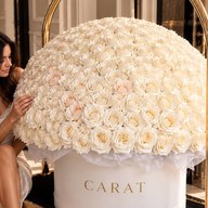 Dome of white roses in a white CARAT box